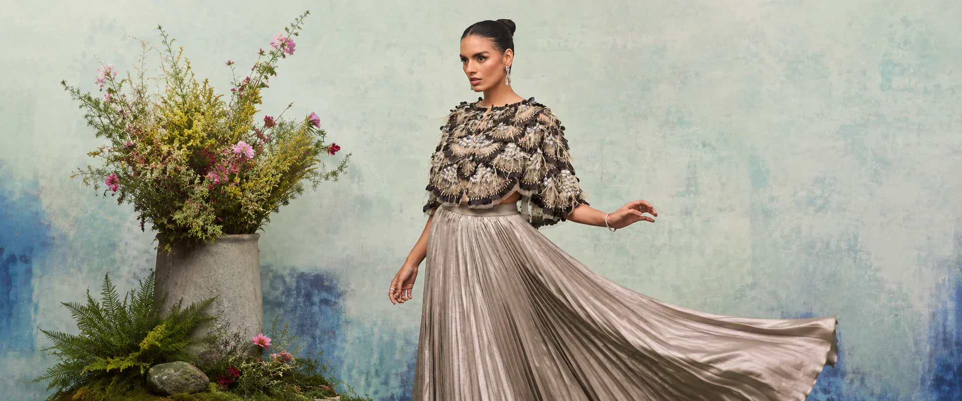Why Are Feather Capes Becoming a Must-Have Fashion Statement?