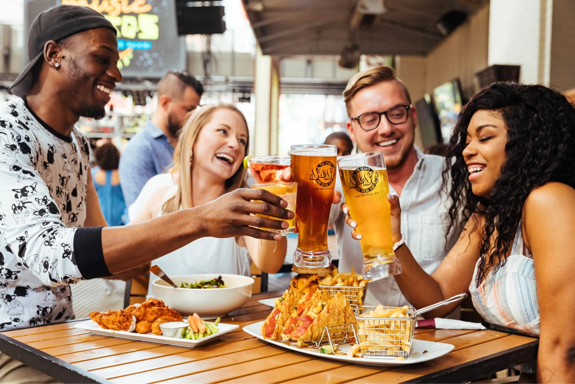 Where Sports Fans and Foodies Unite: Dining at Sports & Social